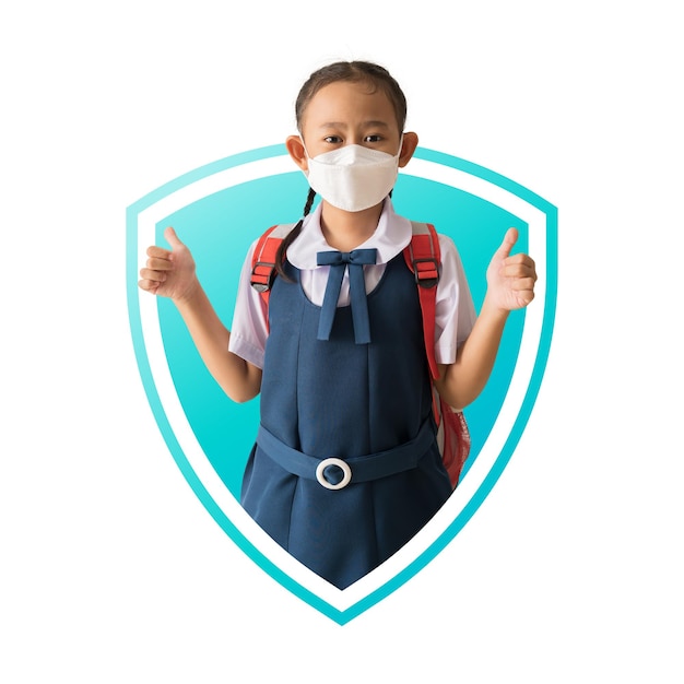 Asian student little girl wear medical face mask with show thumbs up for good In immunity shield protected from viruses and bacterias idea concept isolated Clipping paths for design