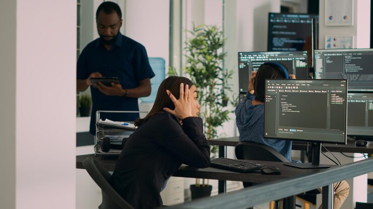 Photo asian system engineer trying to find html script and code to program cloud computing app, using terminal window. working with artificial intelligence big data programming language software.