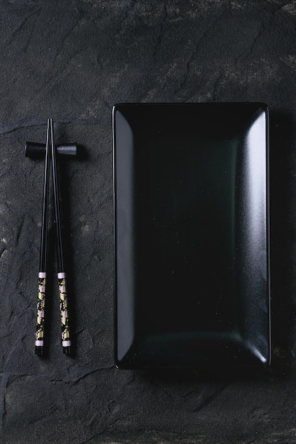 Asian tableware over black