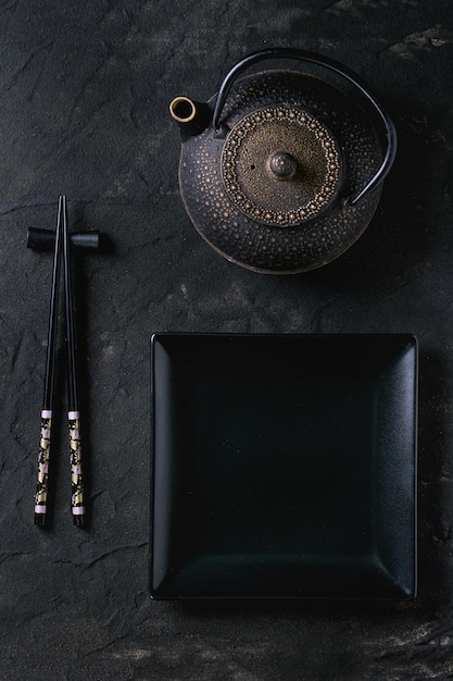 Asian tableware over black