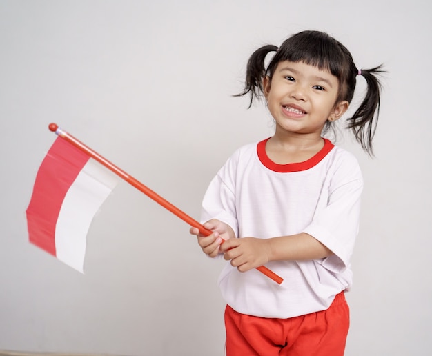 Asian toddler with indonesian flag