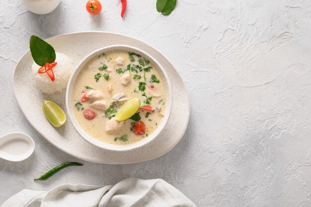 Asian tom kha gai soup spicy coconut with chicken cherry tomato