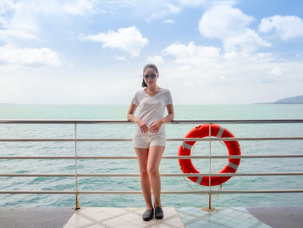 Asian tourist woman on the ferry is on the way for sea trip