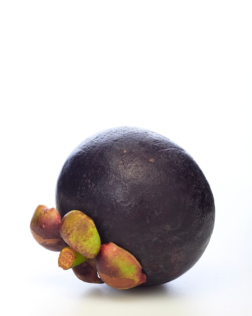 Asian tropical mangosteen fruit on white background