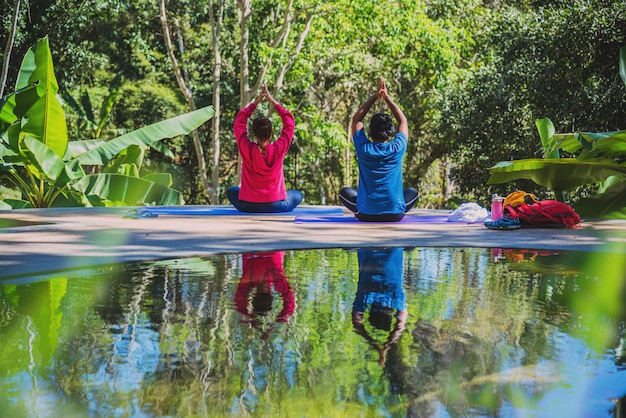 Asian woman and Asian man travel nature.