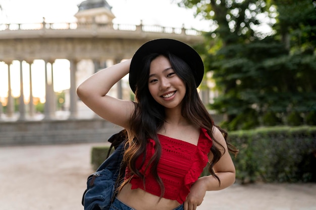 Asian woman backpacker traveler Japanese woman with hat traveling in Europe