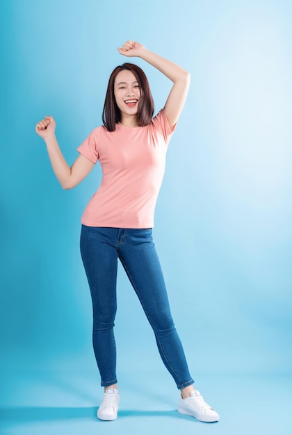 Asian woman on blue background