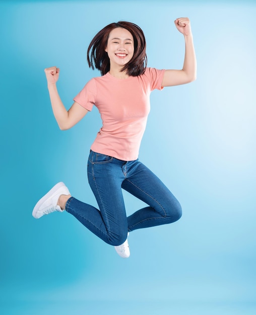 Asian woman on blue background