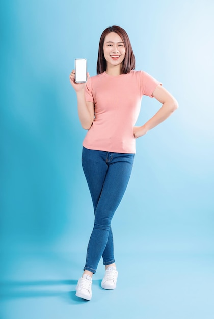 Asian woman on blue background