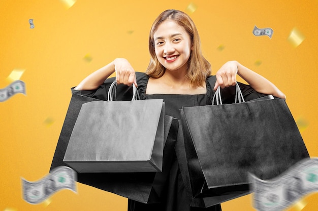 Asian woman carrying a shopping bag