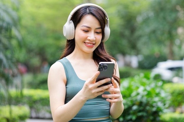 Asian woman exercising at the park