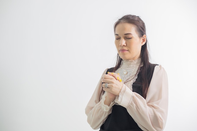 Asian woman hands praying isolate Church services concept