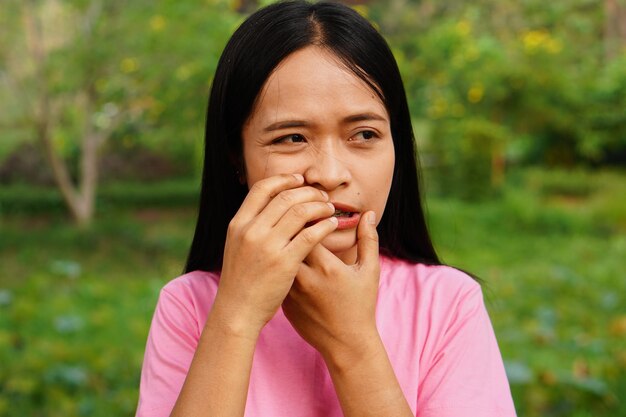 Asian woman has toothache