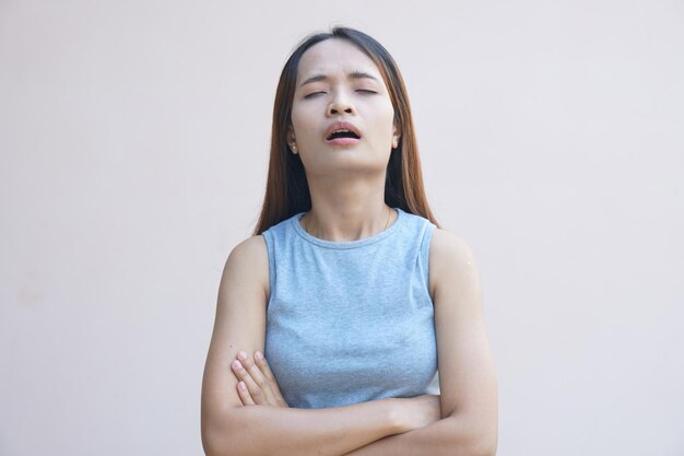 Asian woman having a headache