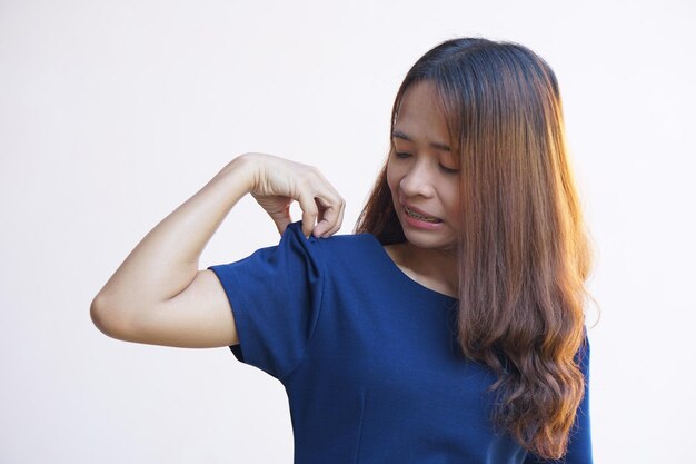 Asian woman having itchy skin