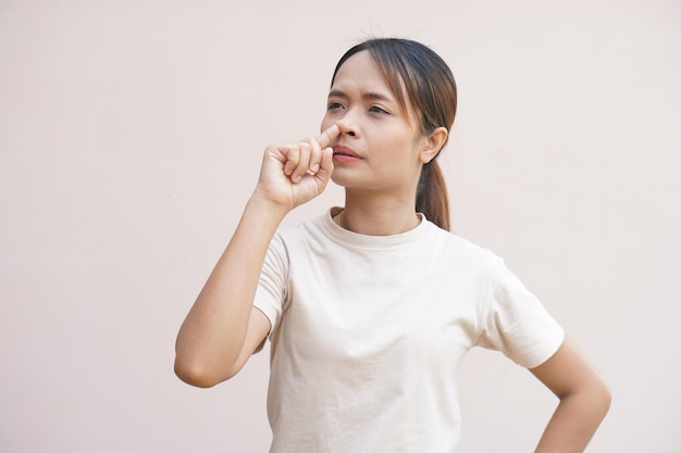 Asian woman having stuffy nose