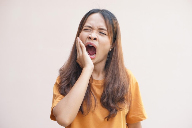 Asian woman having a toothache