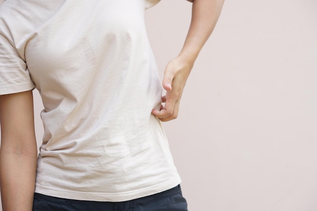 Asian woman having waist itching