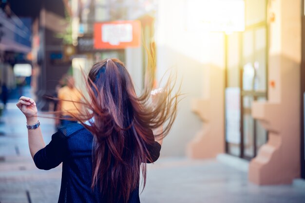 Asian woman having a walk in a mall