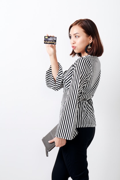 Asian woman holding card