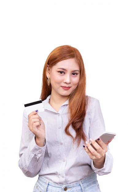 Photo asian woman holding mobile phone and showing credit card