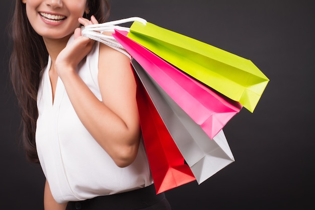 Asian woman holding shopping bag