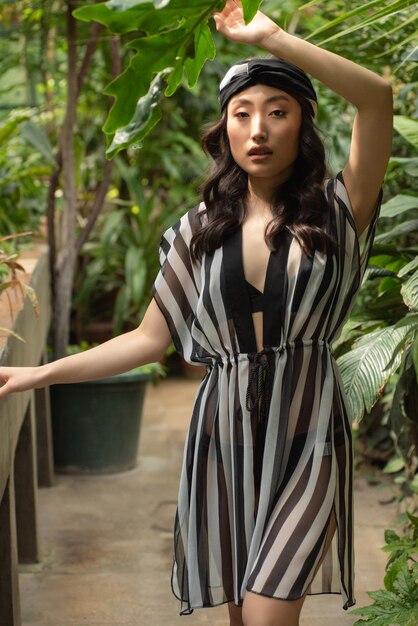 Asian woman on the jungle resort Wearing beachwear tunic