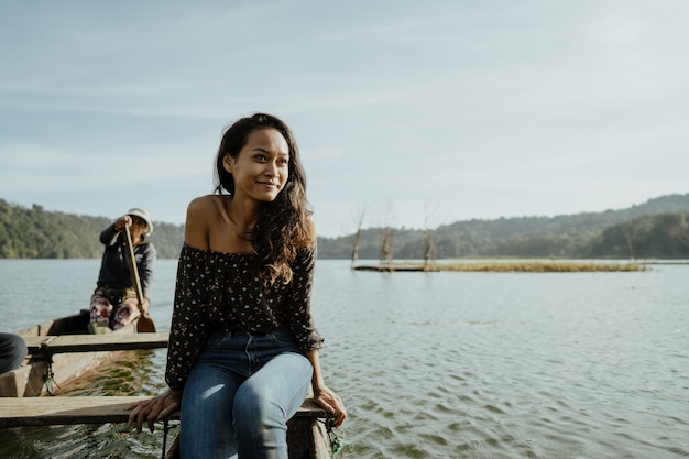 Asian woman in nature enjoying