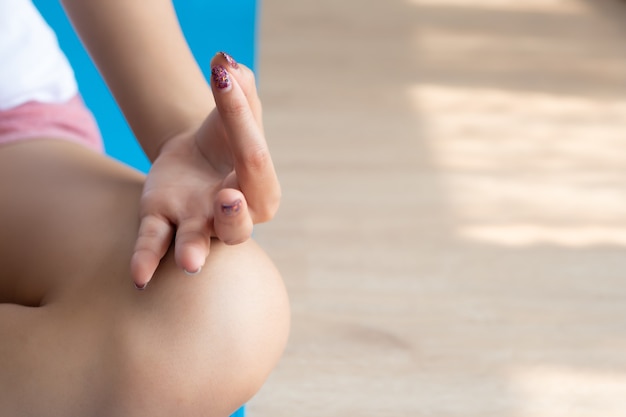 Asian woman practicing yoga