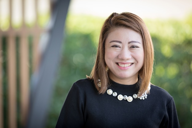 Asian woman smiling happy portrait