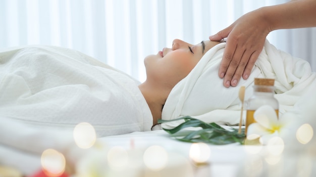 Asian woman in spa salon