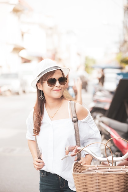 Asian woman tourist walking on the Thai street