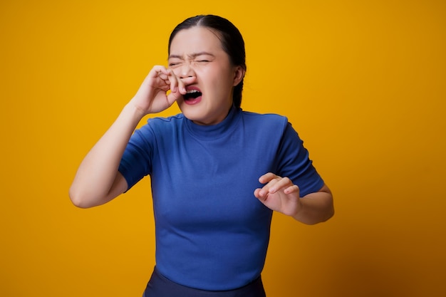 Asian woman was sick with fever on yellow