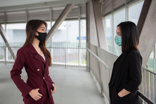 Asian woman wear face mask for protect COVID19 virusThailand peoplesocial distancing