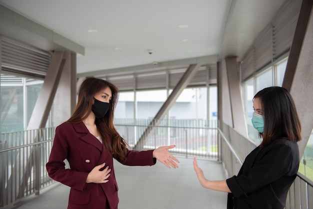 Asian woman wear face mask for protect COVID19 virusThailand peoplesocial distancing