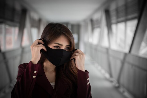 Photo asian woman wear face mask for protect covid19 virusthailand peopleyoung lady shortness of breath coronavirus cough breathing problem