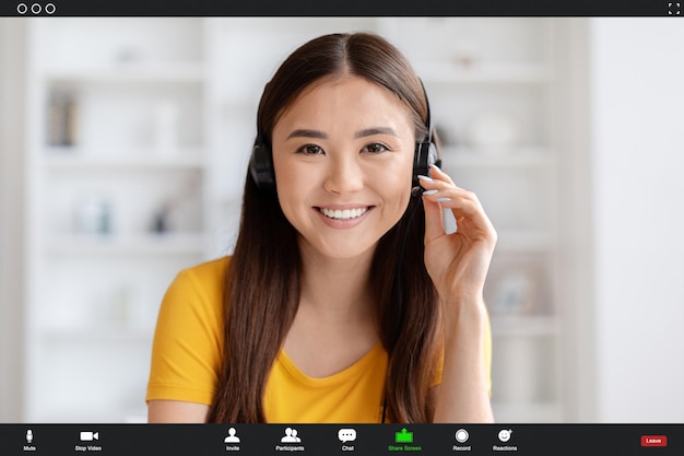 Photo asian woman wearing headset engaging in video call collage with user interface