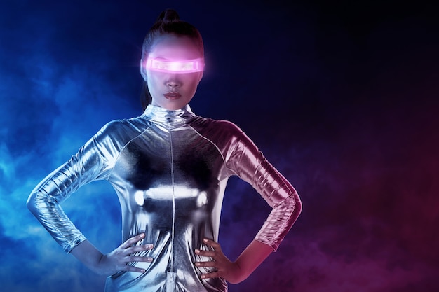 asian woman wearing silver latex suit