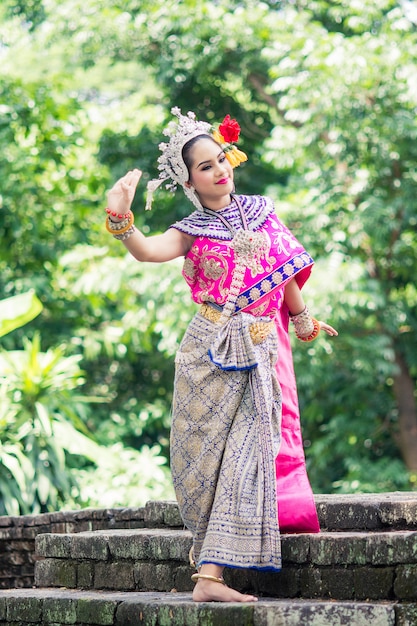 Photo asian woman wearing typical, traditional thai dress, it is literally means