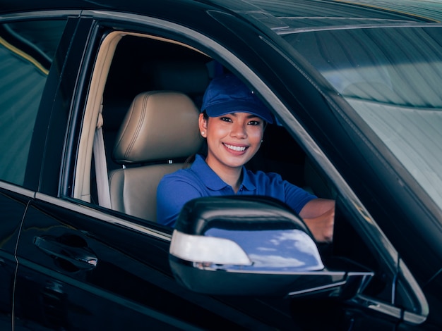 Asian woman with car.