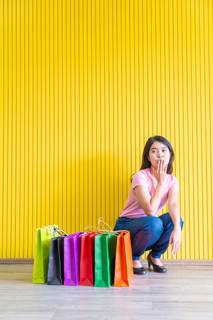 Asian woman with shopping bags