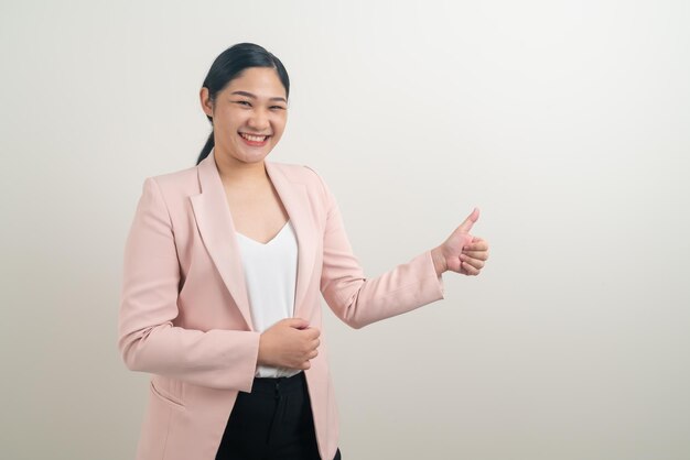 Asian woman with thumb up white background
