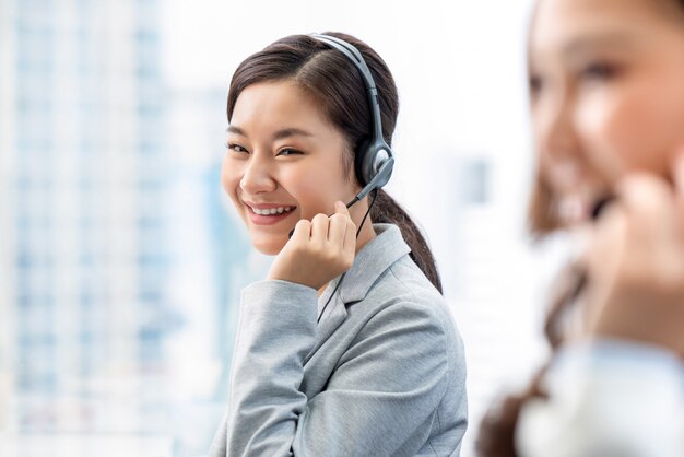 Photo asian woman working in call center office