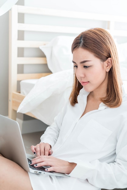 asian woman working at home 