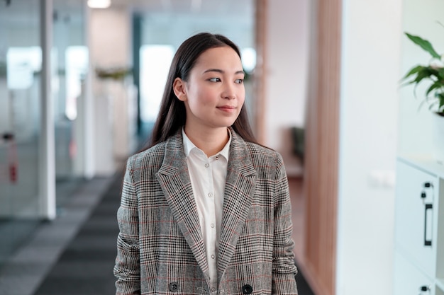 Asian woman working in IT office