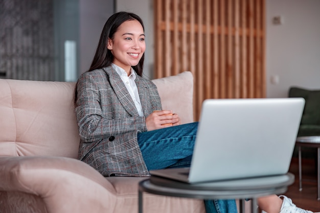 Asian woman working in IT office