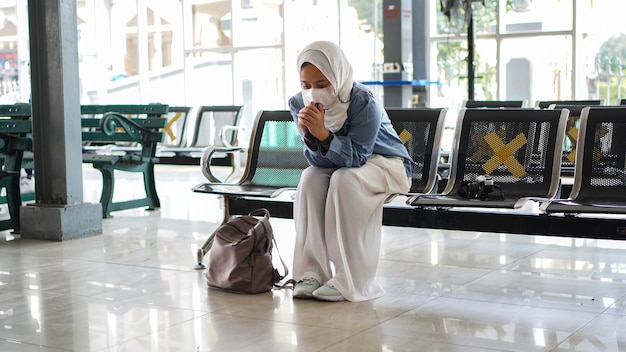 Asian women are tired of waiting at the station