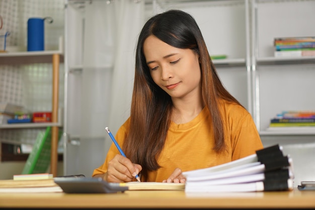 Asian women bring home work