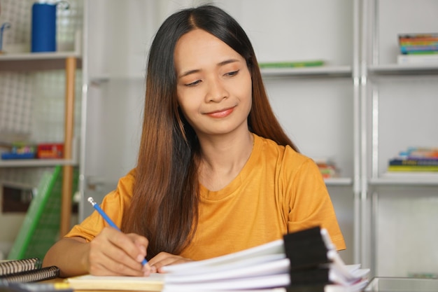 Asian women bring home work