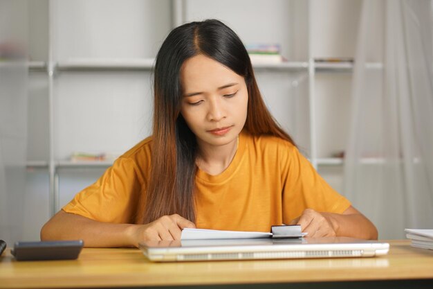 Asian women bring home work